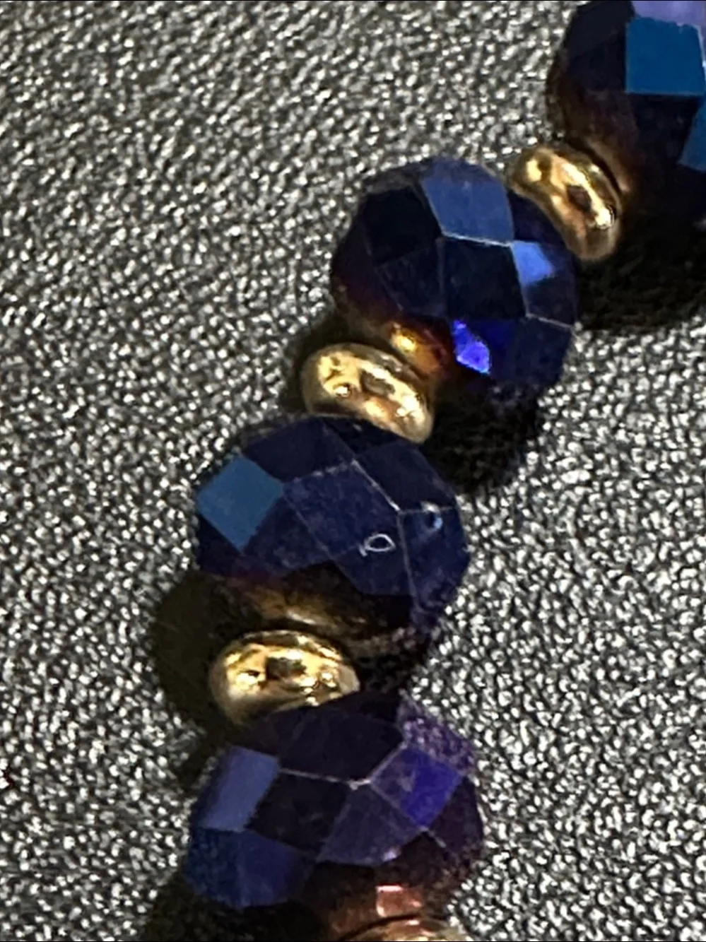 Guess Royal Blue Faceted Crystal Gold Tone Accent Stretch Bracelet